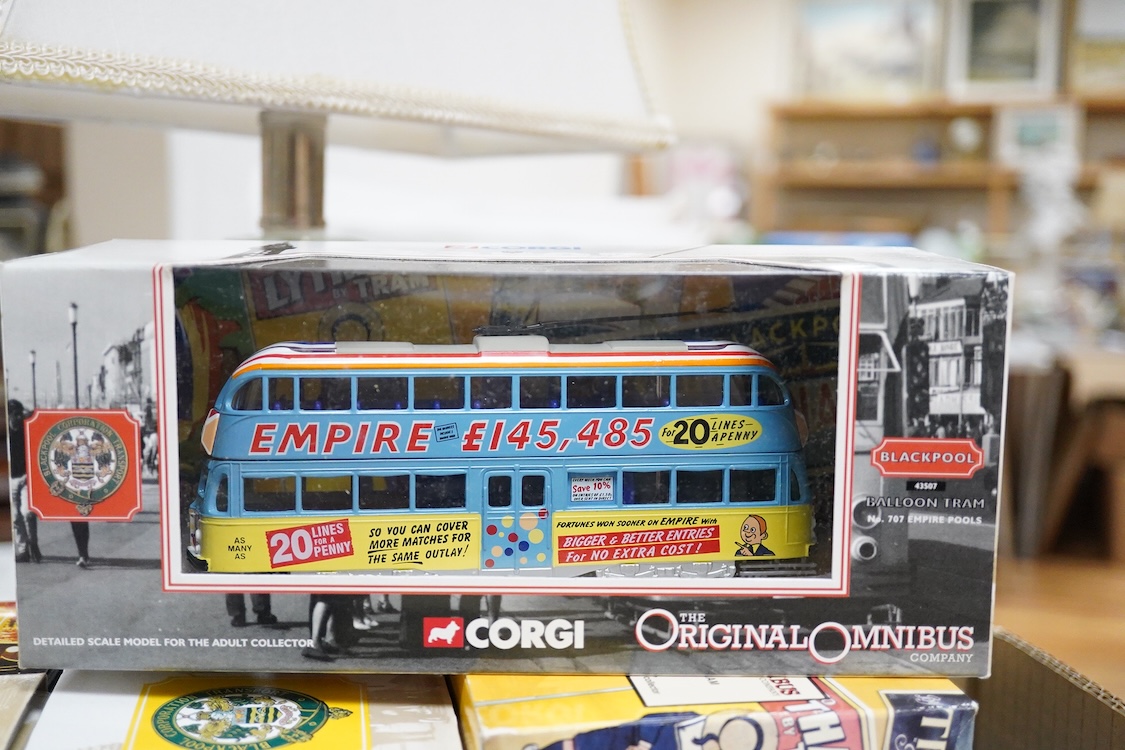 Forty-five boxed diecast trams, buses and other commercial vehicles by Corgi Classic, Corgi OOC, and EFE, operators include Leeds tram, the Tate & Lyle Story set, Blackpool Corporation Transport (seven examples), Thornyc